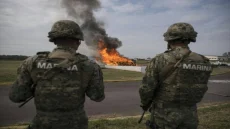  حكم بالسجن 50 عاماً على 11 عضواً سابقاً في كارتيل للمخدرات بعد إدانتهم بقتل 122 راكب حافلة