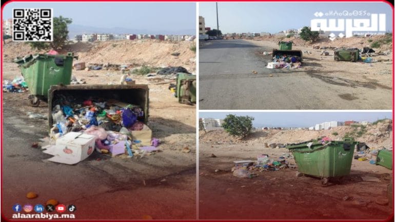 في أكادير التي يرأس مجلسها أخنوش… حاويات أزبال معطلة تُثبّت بـ’لابريك’ في حي الوفاق الصغير